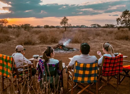 IM_KE_AMB_Sundowner-at-Tulia-Amboseli_Clients-in-front-of-fireplace IM_KE_AMB_Sundowner-at-Tulia-Amboseli_Clients-in-front-of-fireplace